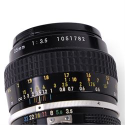 Two Micro-Nikkor camera lenses, comprising AF-S DX 40mm 1:2.8G with user manual, serial no. 2055767 and a 55mm 1:3.5 serial no. 1051782