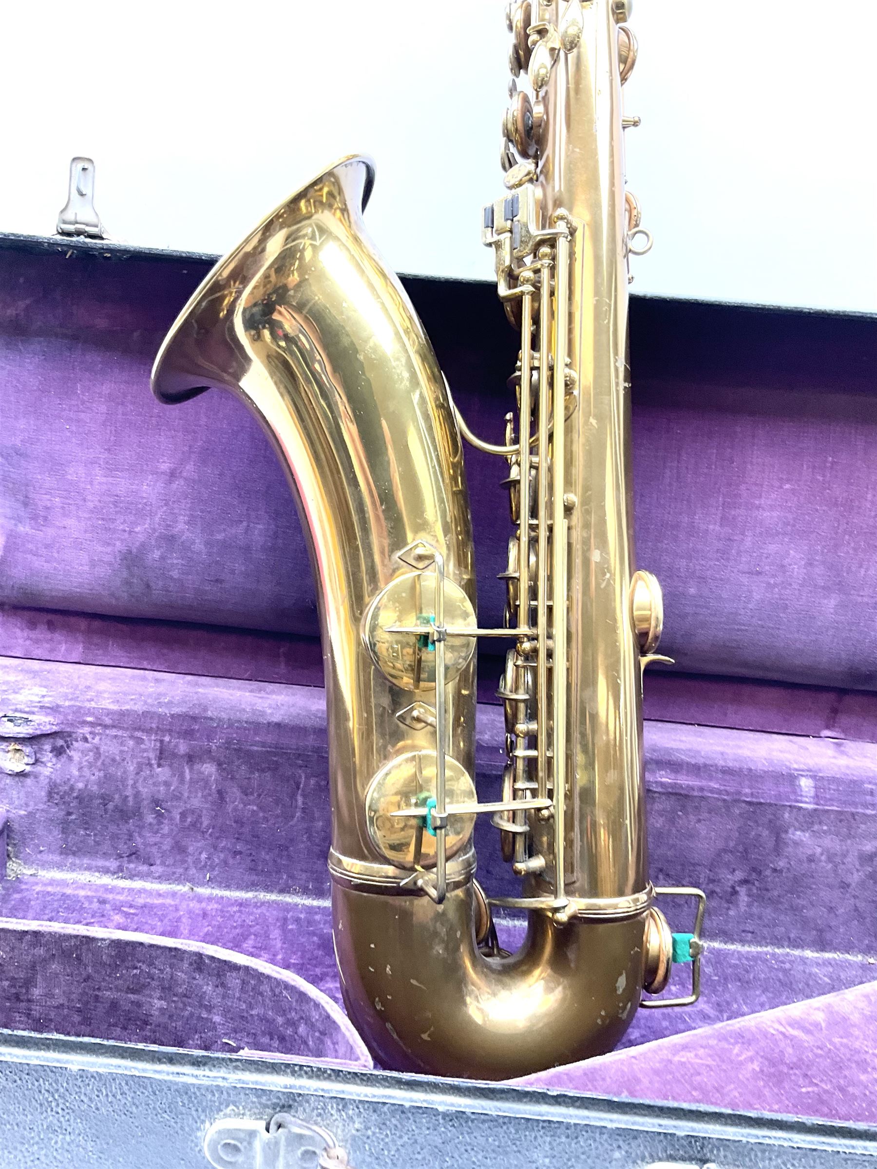 Brass tenor saxophone by Adolphe SAX, 84 Rue Myrha, Paris,  No.938 serial number 12097, H75cm excluding crook; in hard carrying case bearing plaque for Henri Selmer