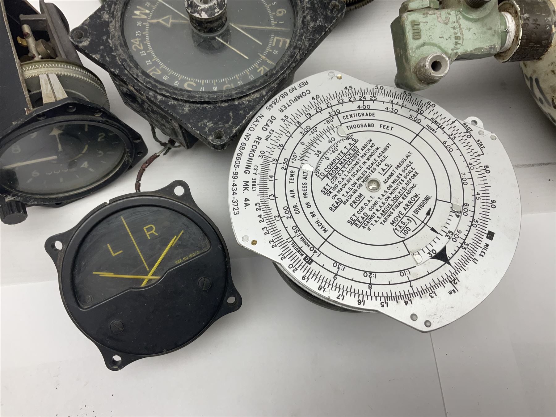 Three RAF light switches, together with military oxygen canister, batteries, gages etc  