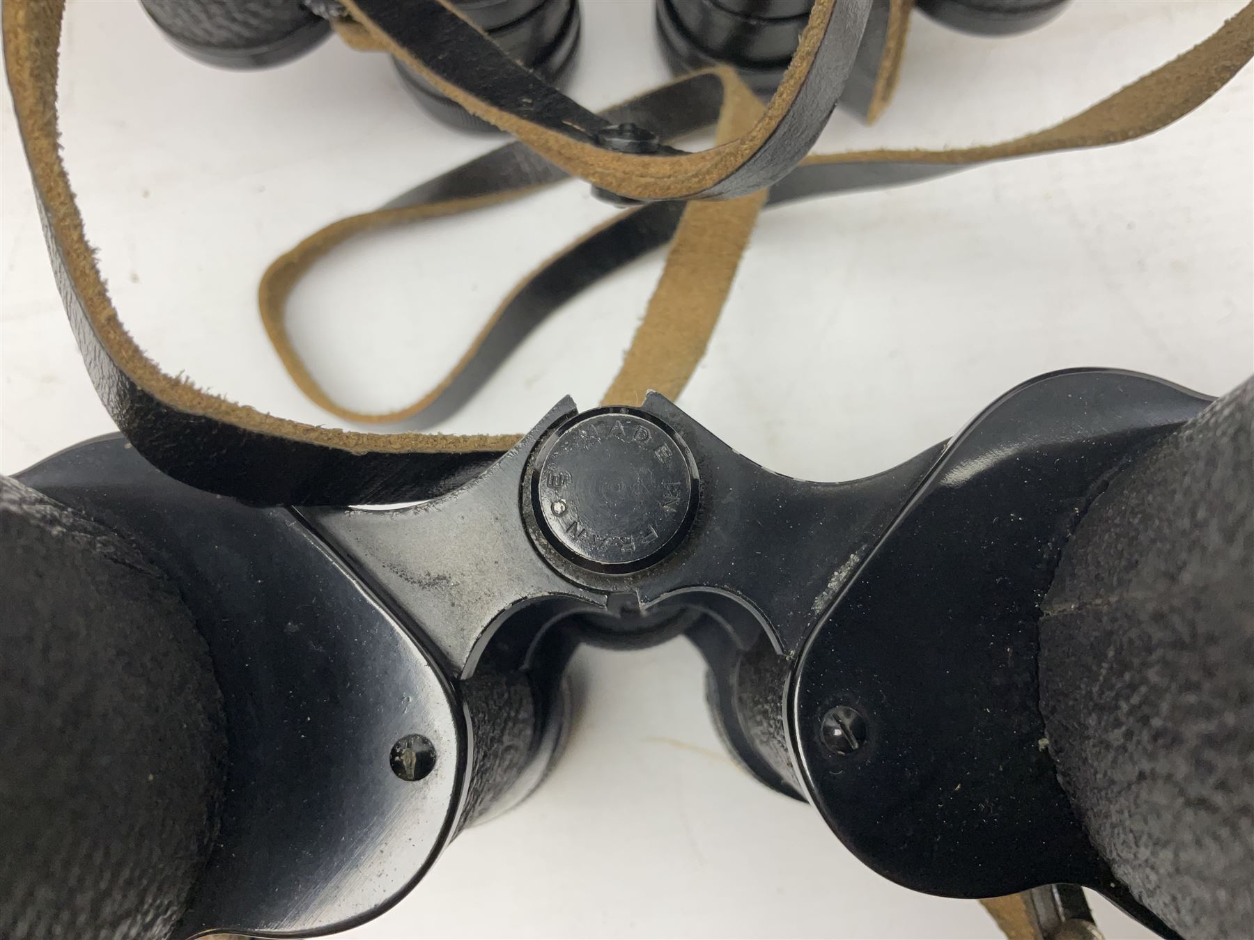 Eleven pairs of binoculars, to include Zeiss Wetzler 20x50, Taylor-Hobson Bino Prism No.2 Mk.III military stamped 1943 with broad arrow,  Swift Tecnar 16x50, J.T Coppock Oceanic Bloomed 10x50, Hensoldt Wetzlar Dialyt 7x42 etc