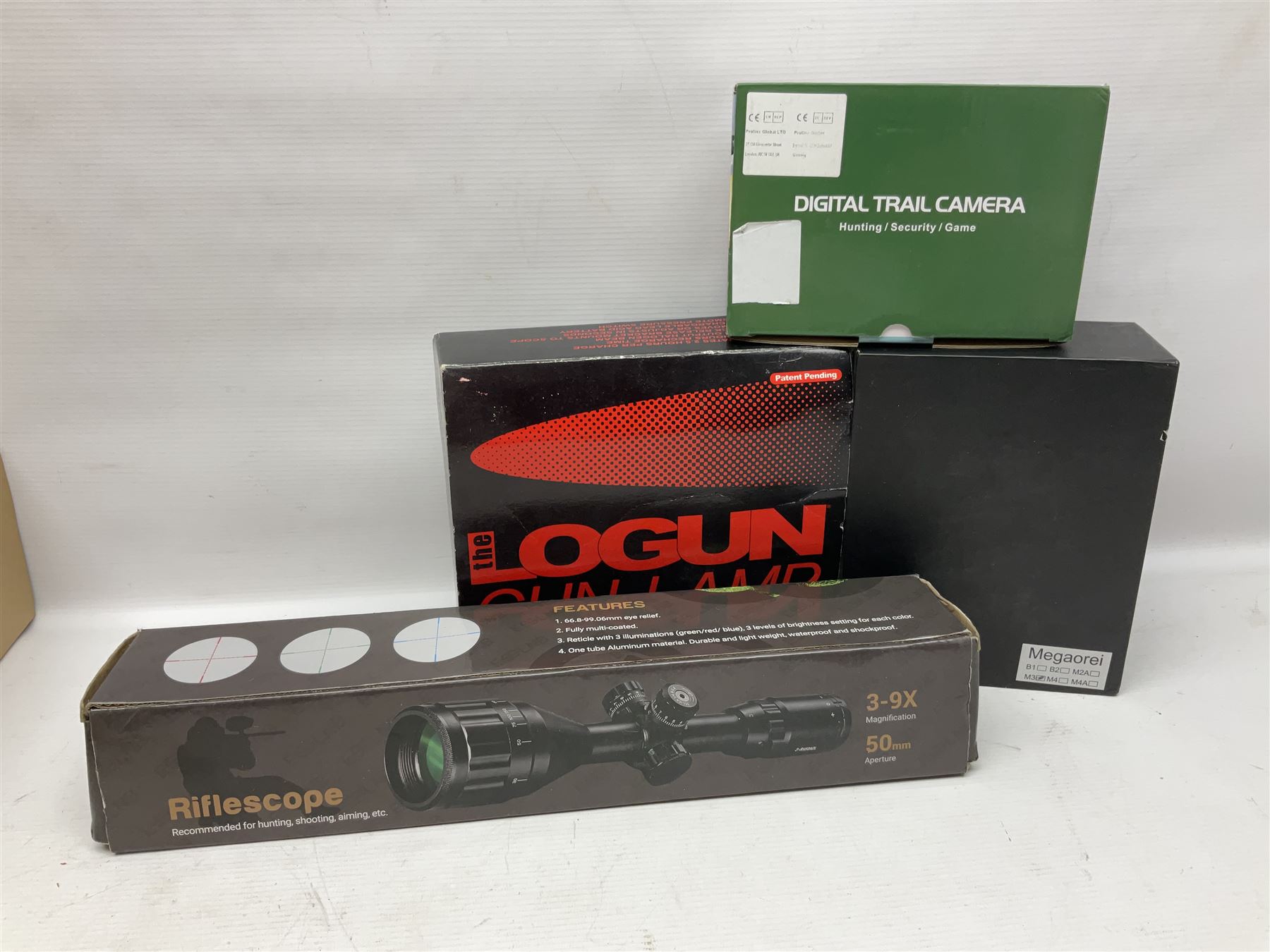 Four shooting accessories - Riflescope 3-9 x 50 scope; Digital Trail Camera; Megaorei M3 night sight add on; and Logan Gun Lamp; all boxed (4)
