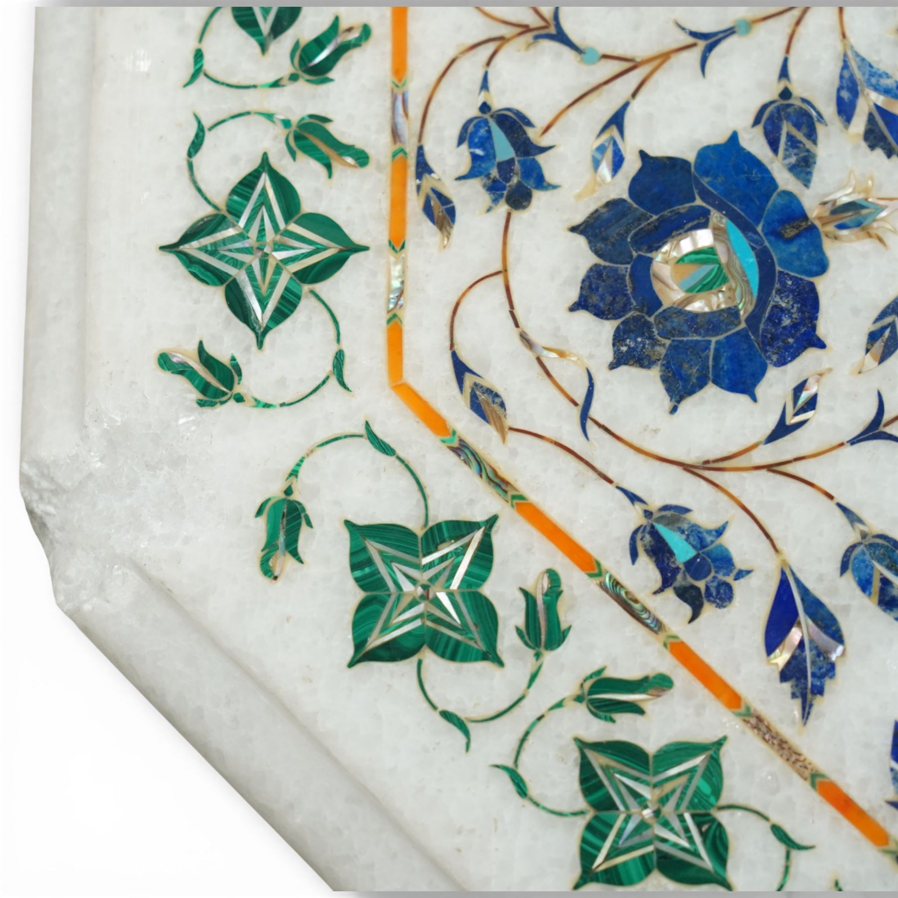 20th century Florentine design composite marble pietra dura centre table, octagonal white marble top inlaid with a polychrome foliate and floral medallion centred by a rosette, within a conforming floral border, raised on a faceted octagonal marble pedestal and stepped base