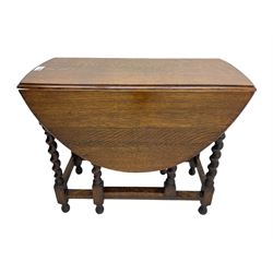 20th century oak drop-leaf dining table on spiral turned supports 