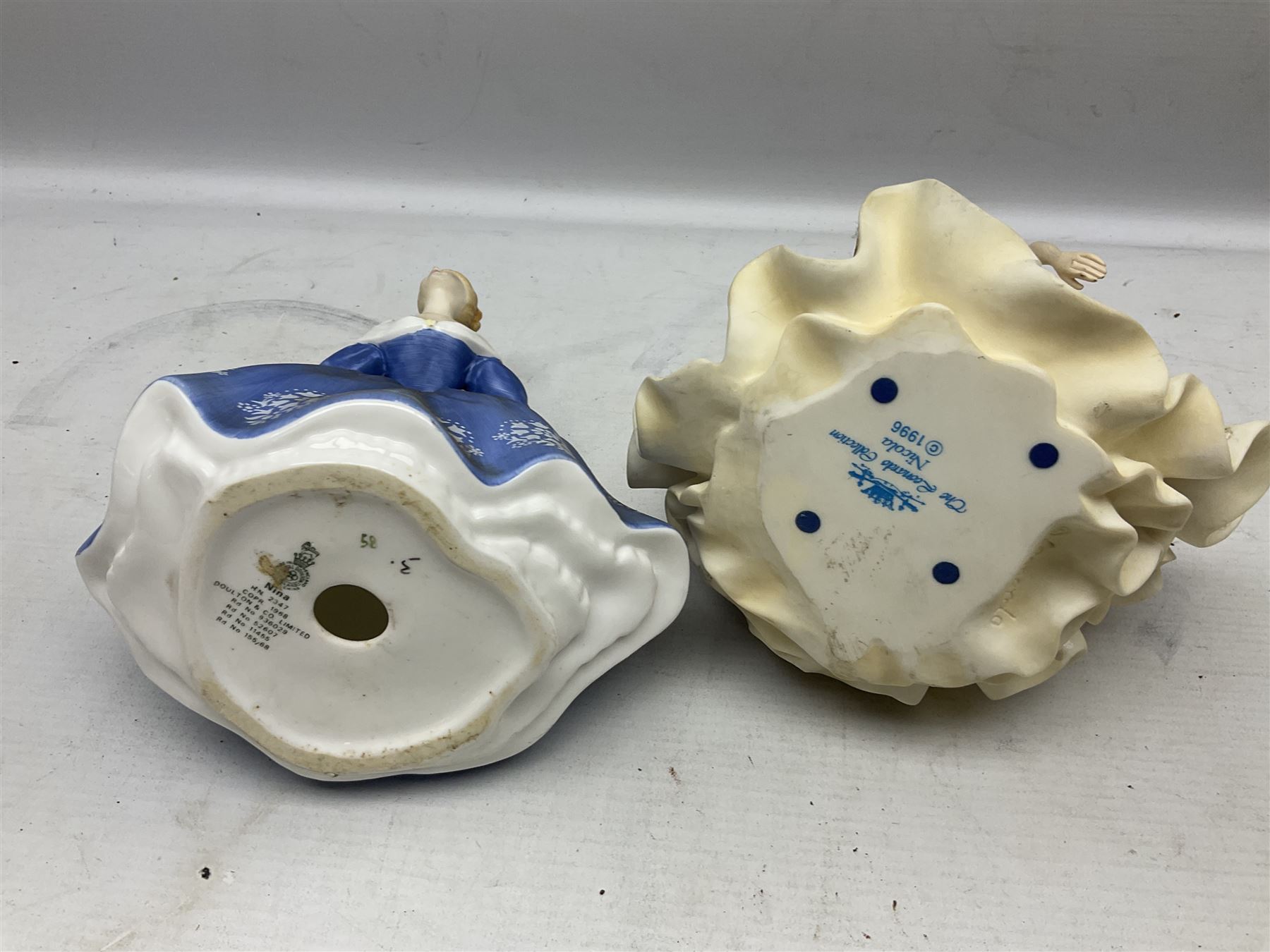 Collection of eight figures comprising Royal Doulton Loretta HN 2337 and Nina HN 2347, Coalport limited edition Emily 740/5000, Danbury Mint Jean, SBL Regal House Collection and three The Leonardo Collection examples