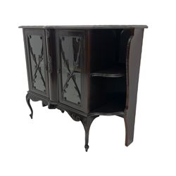 Late Victorian mahogany glazed side cabinet, shaped moulded top over two doors enclosing patterned silk lined shelf, shaped scroll carved apron on cabriole feet