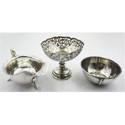 Mid 20th century silver sauce boat, of typical form with curved handle, upon three pad feet, hallmarked Viner's Ltd, Sheffield 1940, H6.5cm, together with an Edwardian silver bowl, hallmarked Synyer & Beddoes, Birmingham 1904, D9.5cm,  and a 20th century silver bon bon dish, the circular bowl with pierced sides, upon a circular stepped pedestal base, stamped 'SILVER', H8.5cm,  approximate total weight 8.25 ozt (256.9 grams), (3)