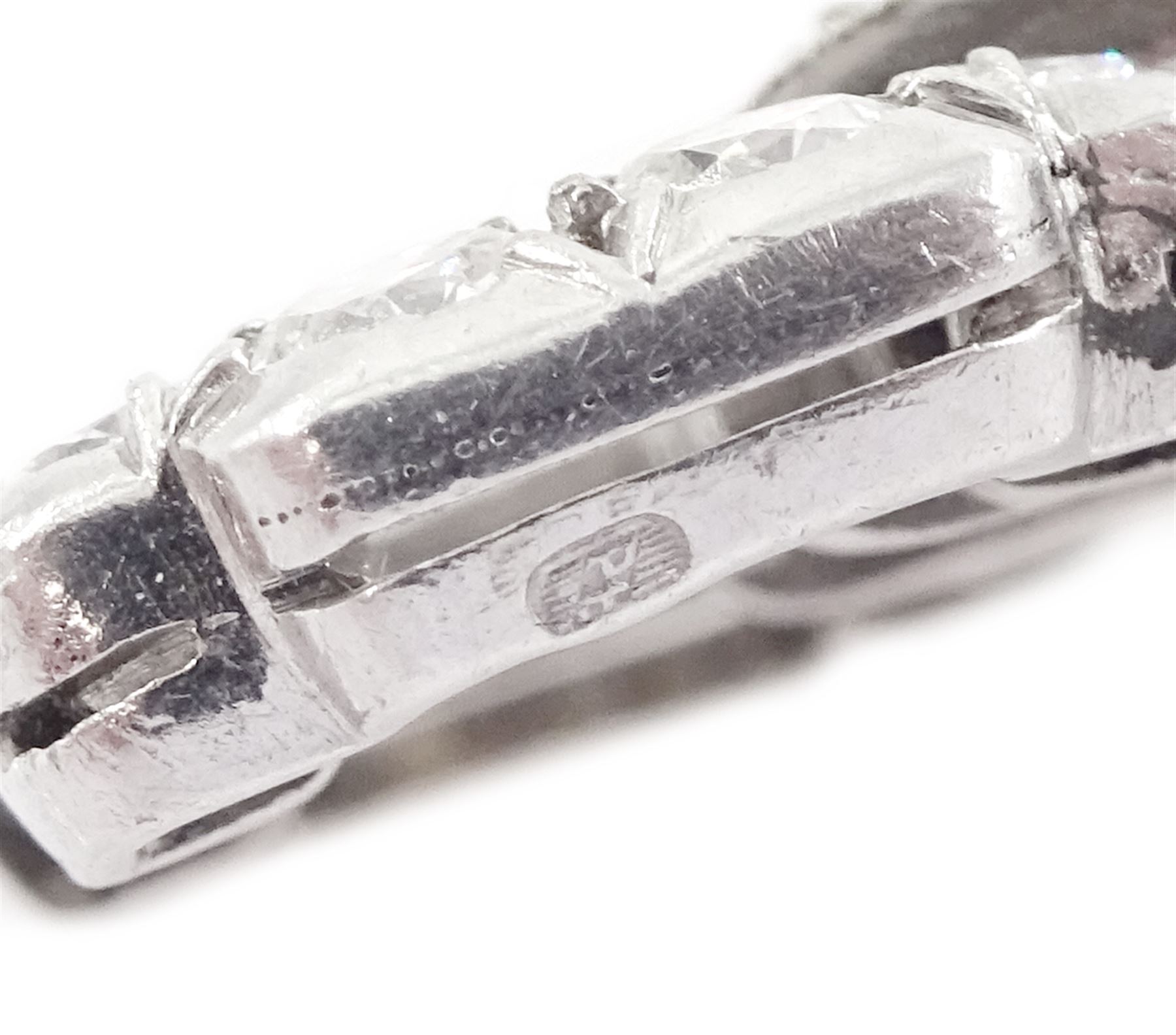 Art Deco platinum milgrain set old cut diamond and calibre cut Burmese sapphire link bracelet, the three principal diamonds each approx 0.50 carat, total diamond weight approx 13.00 - 14.00 carat, stamped Pt, circa 1925, in fitted box by Licht & Morrison, London