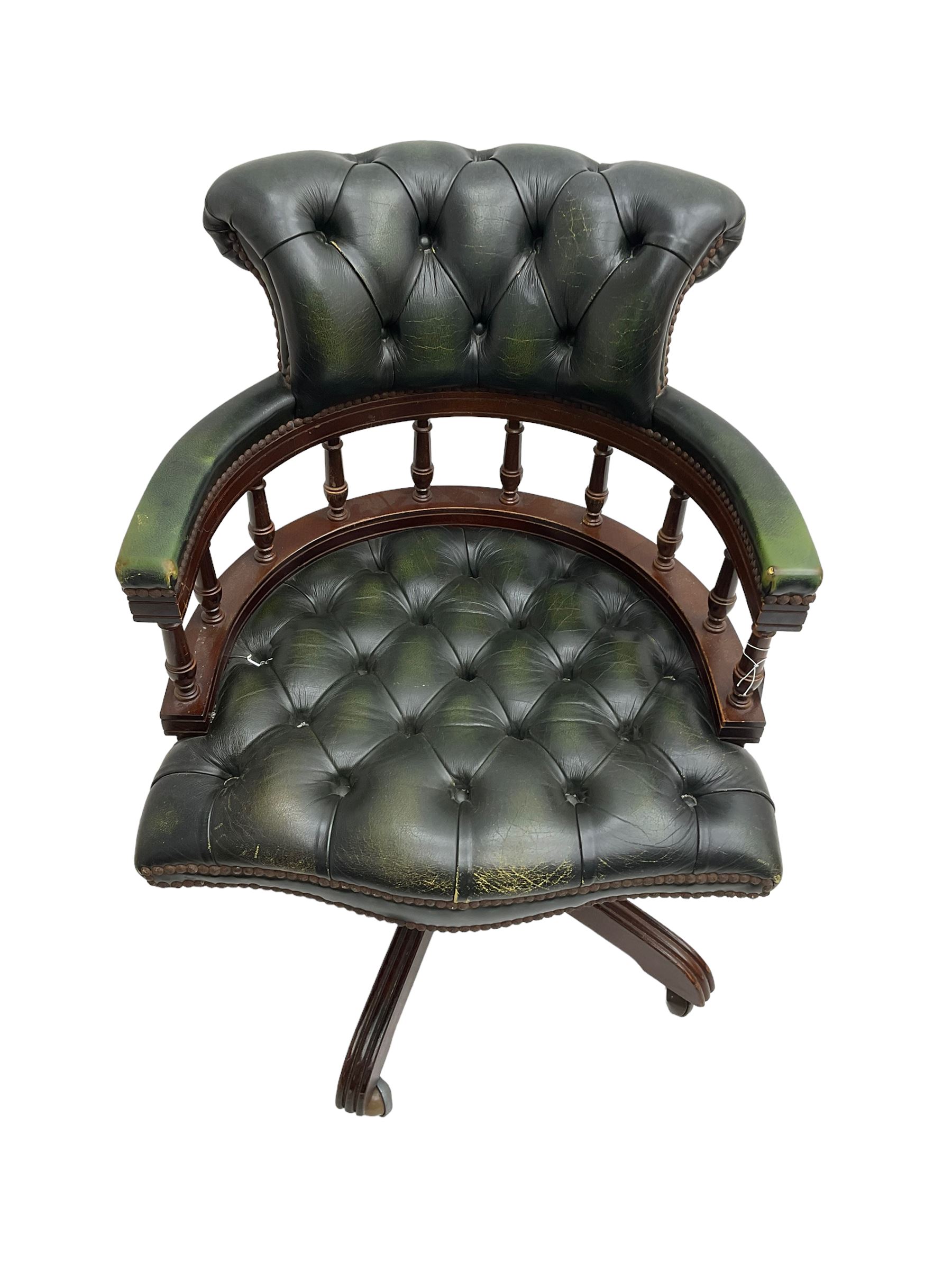 Captains swivel desk chair, upholstered in buttoned leather