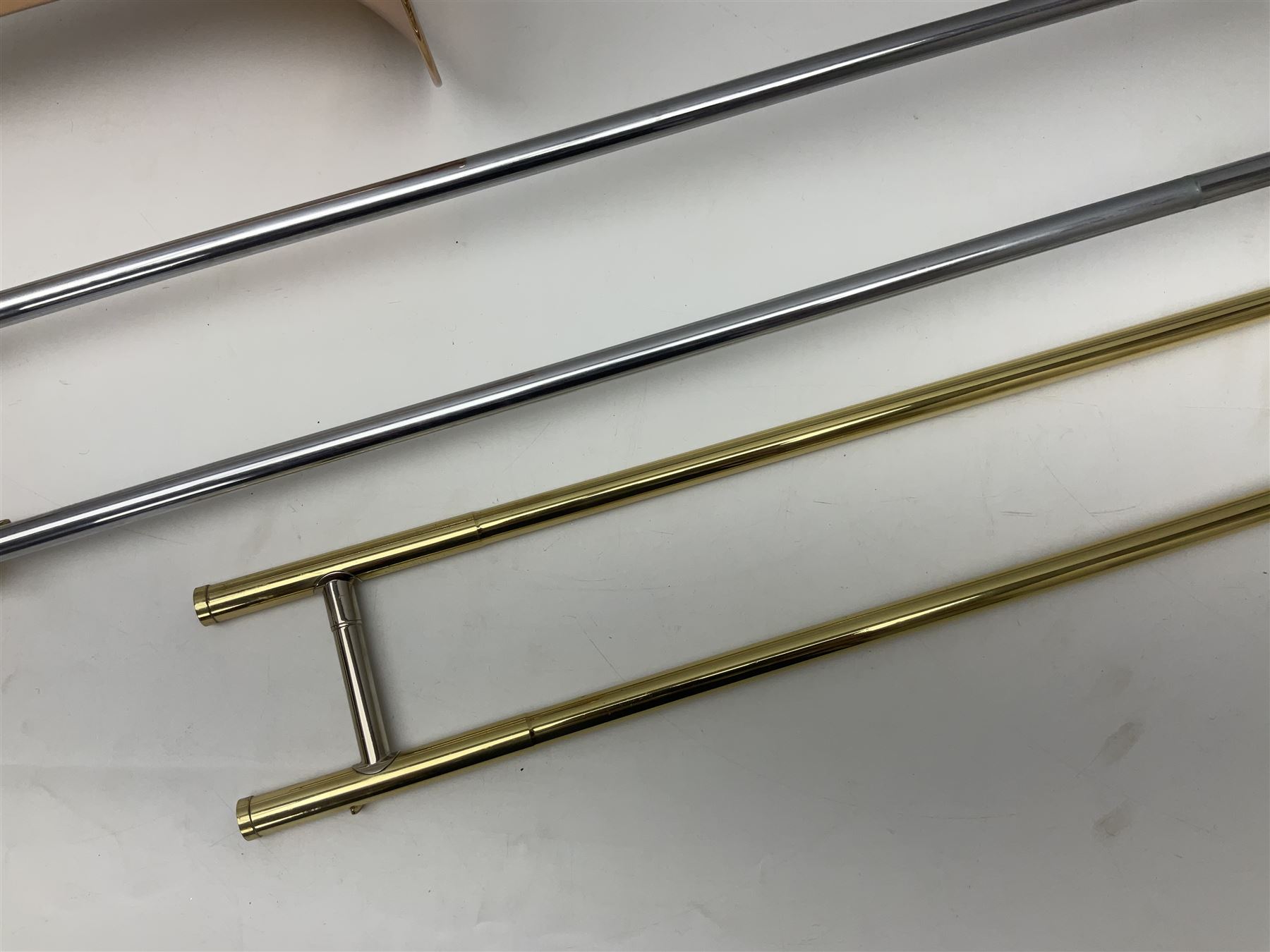 Sebastian Bucklet Aquae Sulis copper and brass trombone No.0910004; in lightweight carrying case; and Kinsman folding tubular chrome music stand in case (2)