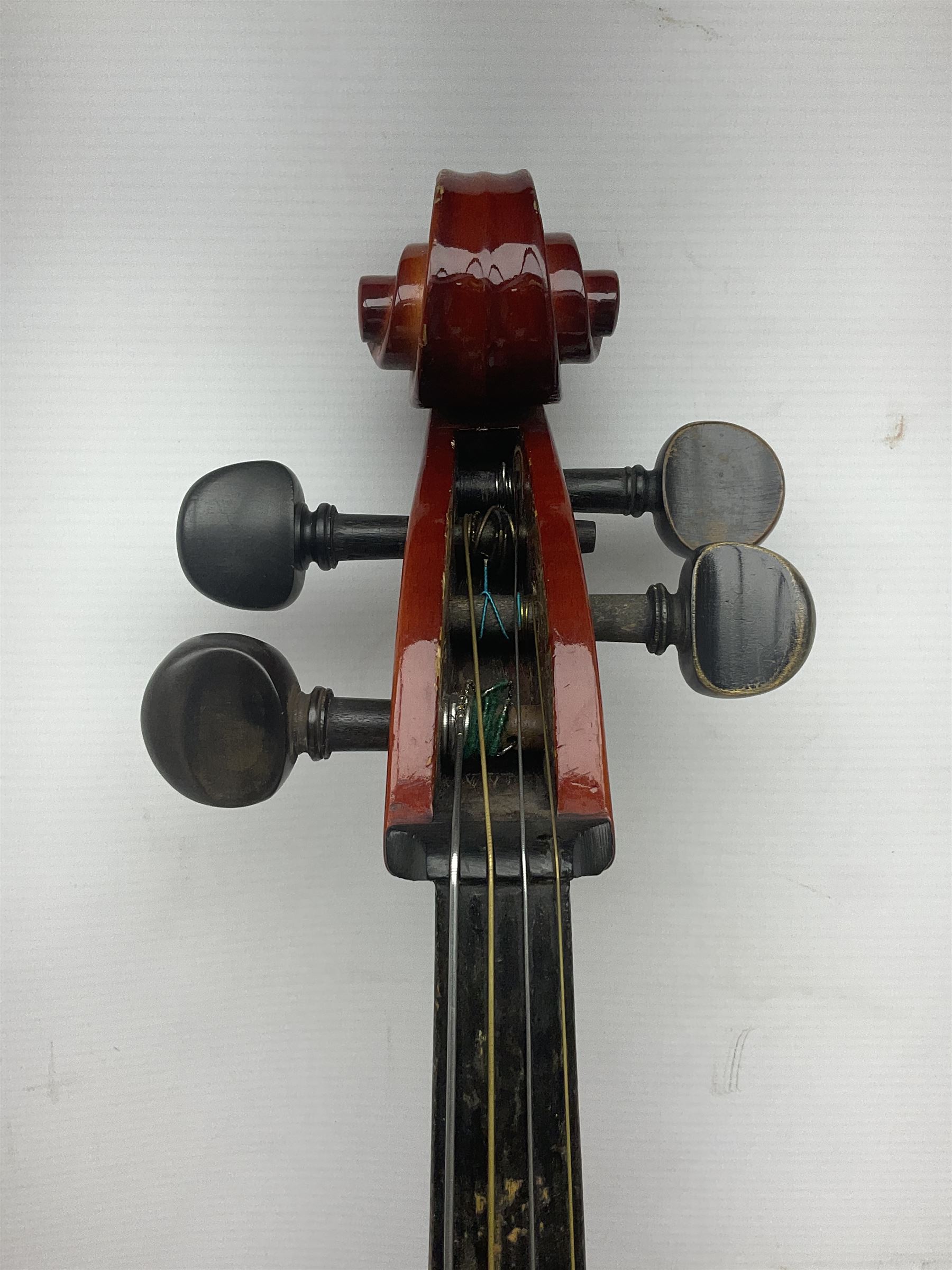 Two student half-size cellos - Boosey & Hawkes Artia with 65cm one-piece back and spruce top; bears maker's label; L104cm overall; and Romanian with 65.5cm two-piece maple back and ribs and spruce top; bears label; L108.5cm overall; each in soft carrying case with two bows (2)