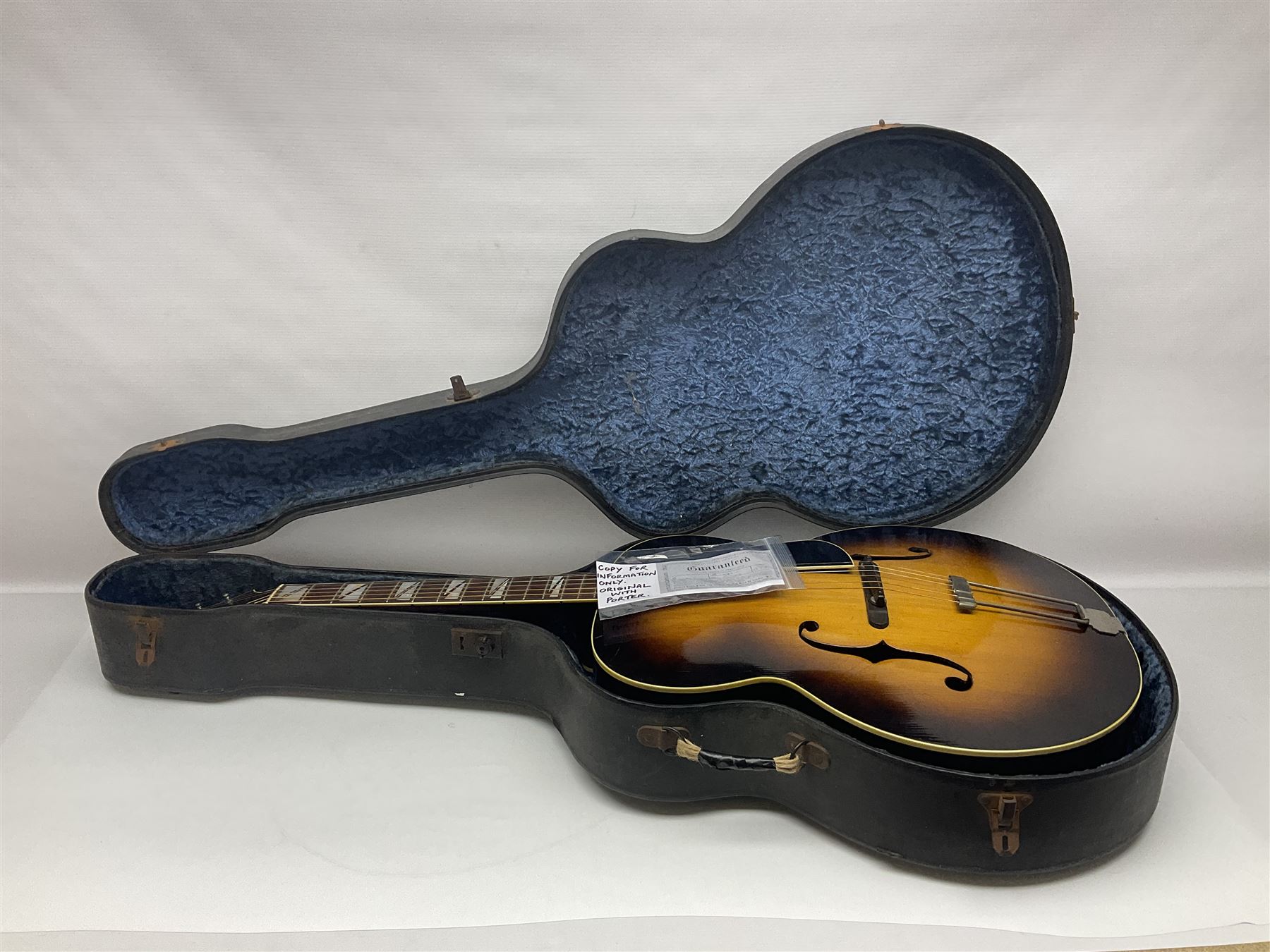 Clifford Essex Paragon De Luxe handmade acoustic guitar c1936 with tobacco sunburst finish and original machines; serial no.501 with original guarantee card L108.5cm; in original case