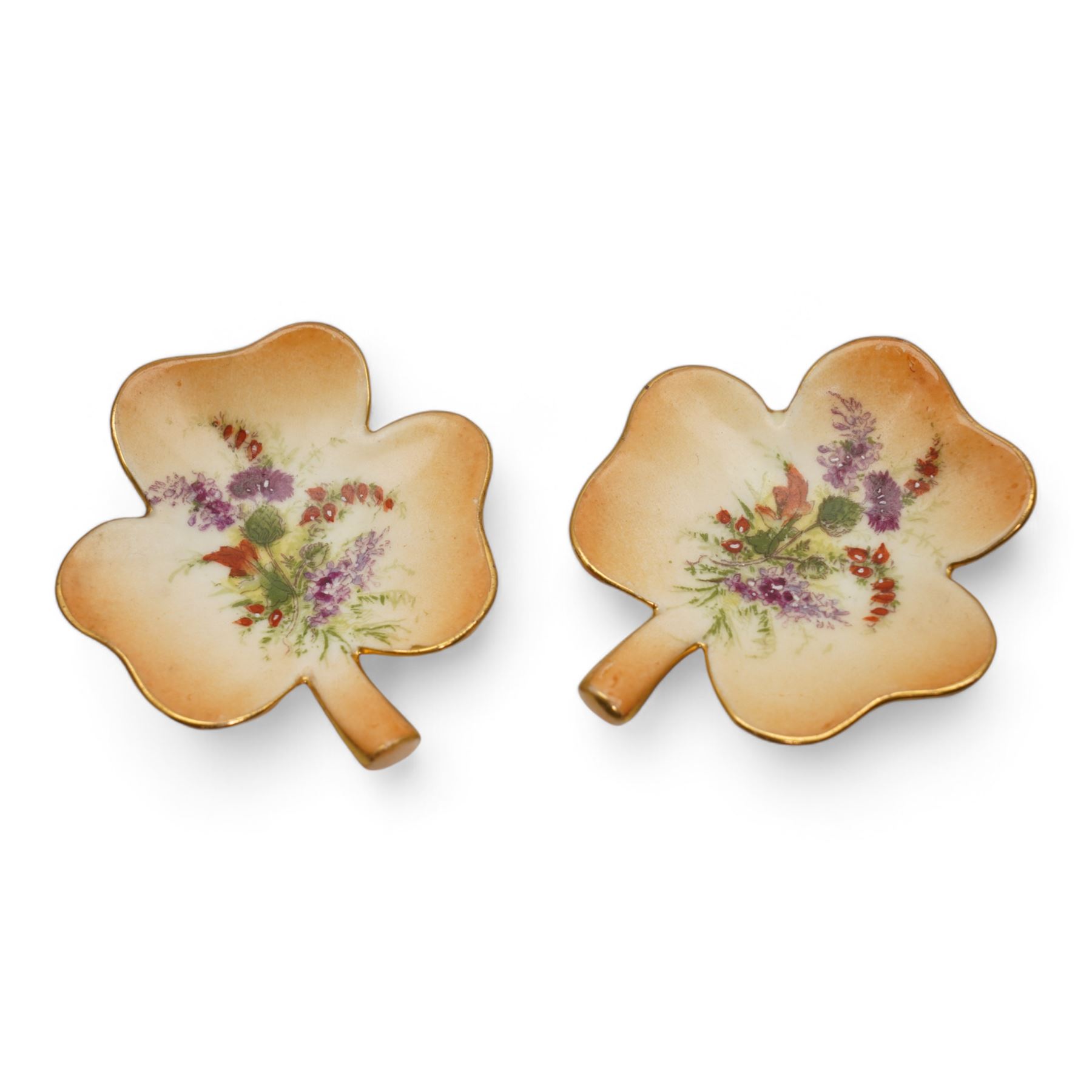 Royal Worcester blush ivory porcelain to include a pot pourri bowl with pierced cover, no. G935, ewer with winged beast moulded handle no. 1048, three further ewers, no 1094, shell shaped dish no. 1413 and two similar style leaf shaped dishes (8)