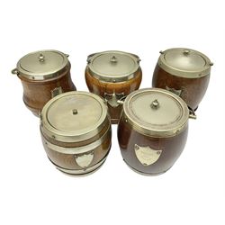 Five early 20th century biscuit barrels with silver-plated mounts, one made from Mahogany from HMS Hindustan