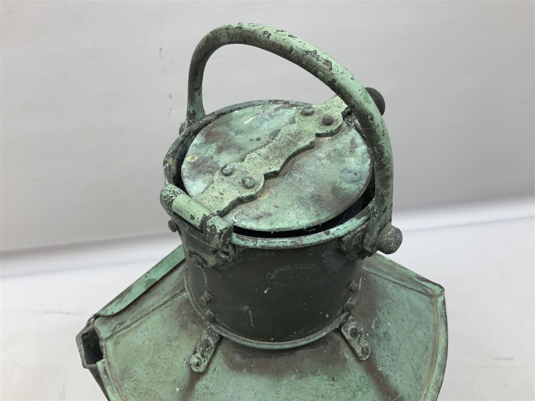 20th century Alderson & Gyde Ltd copper ship lantern, with swing handle and a plaque inscribed Bow Port Patt 23 and ribbed clear glass shade