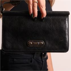 Tod’s - Fashion Pochette Piccola in Nero crinkled patent leather, the rectangular body wit...