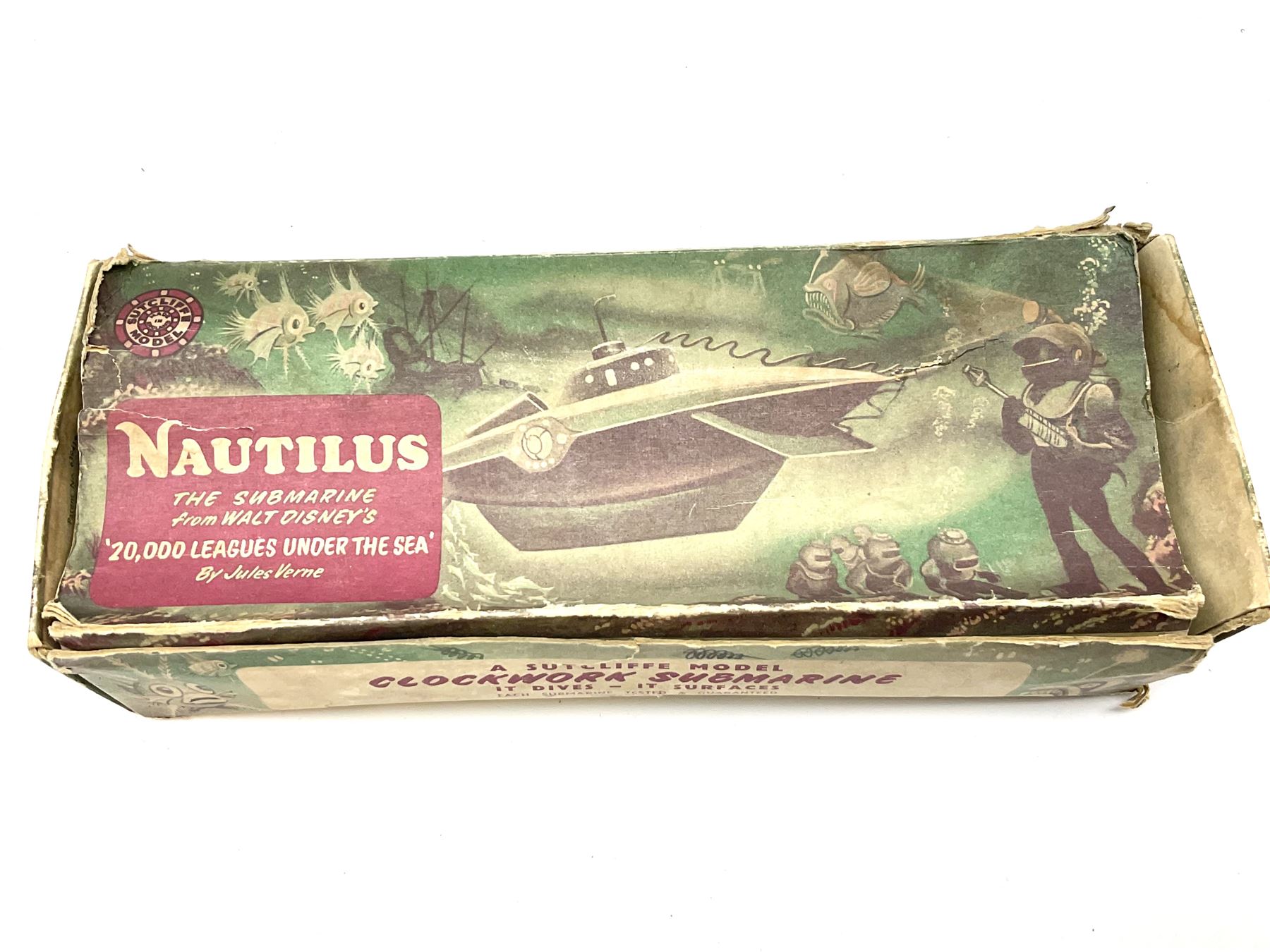 Sutcliffe Models ‘Nautilus’ tinplate and clockwork submarine from Walt Disney’s ’20,000 Leagues Under The Sea’ by Jules Verne, sea green body with various decals, rubber bung with periscope, boxed with inner cardboard display piece, produced between 1955-1960