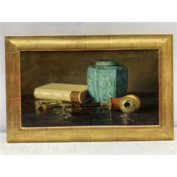 Elaine Katherine Grimshaw (British 1877-1972): Still Life of a Chinese Jar Pipe Book and Spectacles, oil on canvas signed and dated '97, 25cm x 45cm
Notes: Elaine daughter of John Atkinson Grimshaw married E. Ragland Phillips at the age of twenty in 1897. Elaine studied at Balliol College Oxford and whilst there she attended the Ruskin School of Art Oxford. After her marriage, she signed her work, Elaine K Phillips or Elaine Phillips or E Ragland Phillips