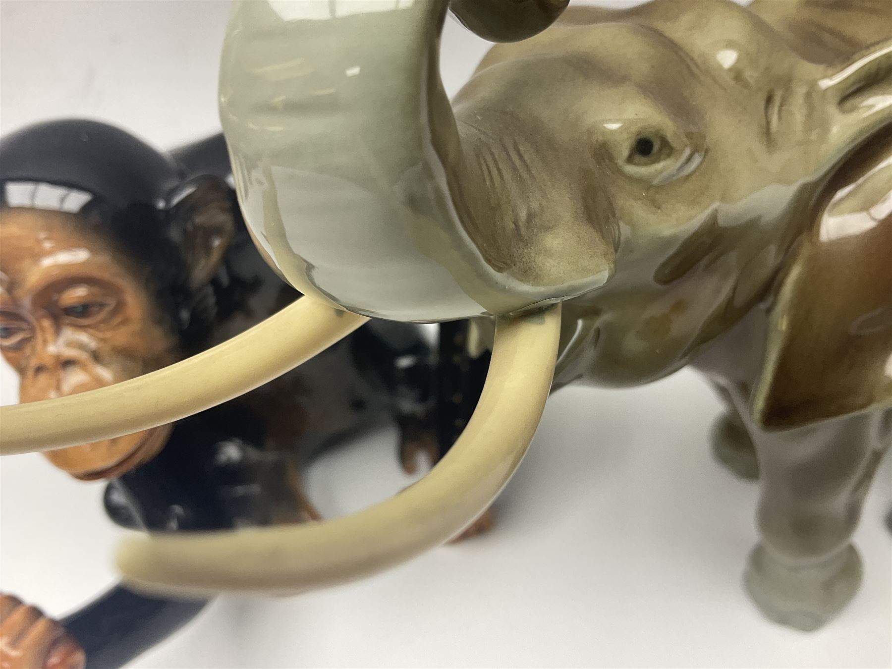 Large Sylvac monkey together with three smaller monkeys, together with Beswick Pigeon no 1383, Melba Ware hippo and baby and Royal Dux elephant 