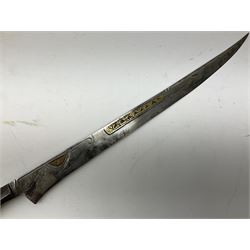 19th century Algerian Flyssa long knife, the 34cm single edged pointed decorative blade inset with yellow metal, chased brass grip with pommel as the snout of a stylised animal and carved hardwood scabbard L45cm overall