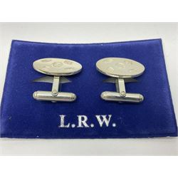 Pair of silver cufflinks, of oval form, with decorative Diamond Jubilee hallmark, Laurence R Watson & Co, Birmingham 2012