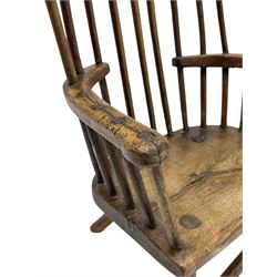 18th century primitive elm child's Windsor, comb back with plain cresting rail, curved arms with visible joins, splayed supports with front stretcher, with evidence of green and black paint mainly to the underneath 