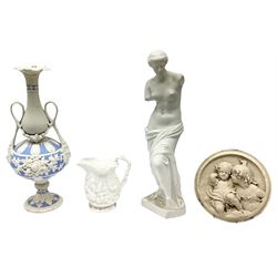 Victorian Parian ware twin handled vase detailed with Bacus masks fruiting vines and floral sprays H36cm, together with a Parian jug H14.5cm, classical Parian sculpture H40cm, decorative plaque decorated in high relief depicting two children D18.5cm. 