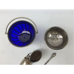 Silver footed bowl, hallmaked, with silver handed button hook, hallmarked,  Sheffield plate blue glass lined swing handled sugar basket and a silverplate shoe shaped pin cushion 