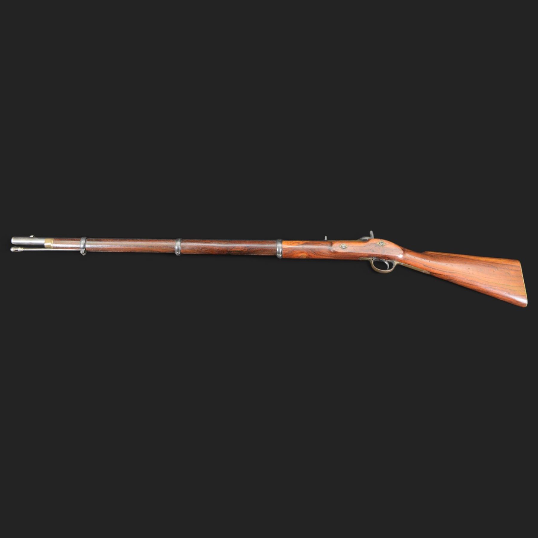 Enfield .577 action rifle, the 91.5cm rifled barrel with three barrel bands and ramrod under, full walnut stock, action marked 'Enfield' with Victoria cypher, overall L131cm