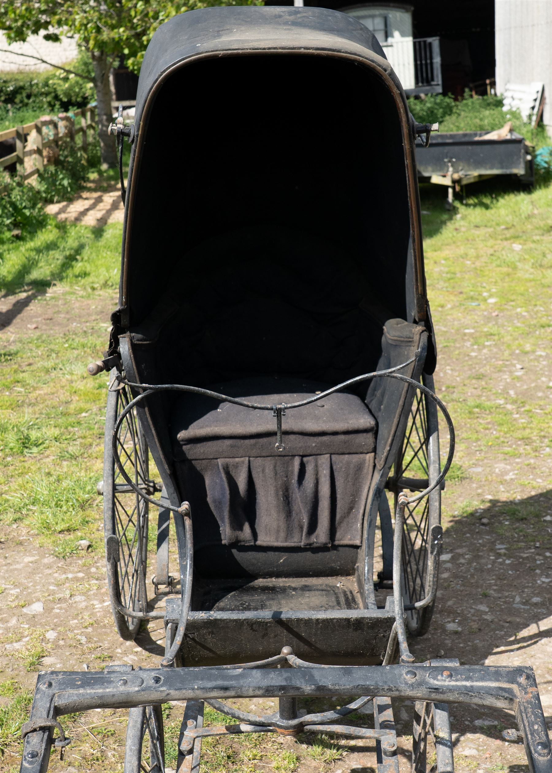 Victorian Bath Chair / Invalid Carriage Converted for Horse Drawn Use

A Victorian bath chair or invalid carriage, later converted for horse drawn use, with black painted bodywork, blue side panels, folding black leather hood and upholstered single passenger seat. The carriage is fitted with large rear wire spoked wheels, smaller front steering wheels, long shafts, footwell and curved body sides, consistent with a late nineteenth century invalid carriage or bath chair form adapted for pony or light horse use.

Features

Bath chair or invalid carriage form
Later converted for horse drawn use
Folding black leather hood
Single upholstered passenger seat
Deep footwell
Black painted body with blue side panels
Large rear wire spoked wheels
Smaller front steering wheels
Long shafts
Lightweight carriage frame

Dimensions:
Overall length: 380 cm
Body length: 204 cm
Width: 88 cm
Height: 178 cm

Wheel Diameters:
Front wheels: 47 cm
Rear wheels: 88 cm

Seating:
Driver: 1
Passenger: None