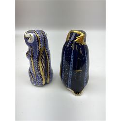 Two Royal Crown Derby paperweights comprising Rockhopper Penguin designed by John Ablitt, date mark for 2001, together with a Chipmunk example, both with gold stoppers