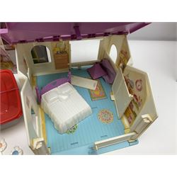 1980s Hasbro My Little Pony - Dream Castle and Show Stable; both boxed, together with Lullaby Nursery and Carry Case; ten generation one ponies, including Majesty, Skydancer and Locket; and assorted accessories 