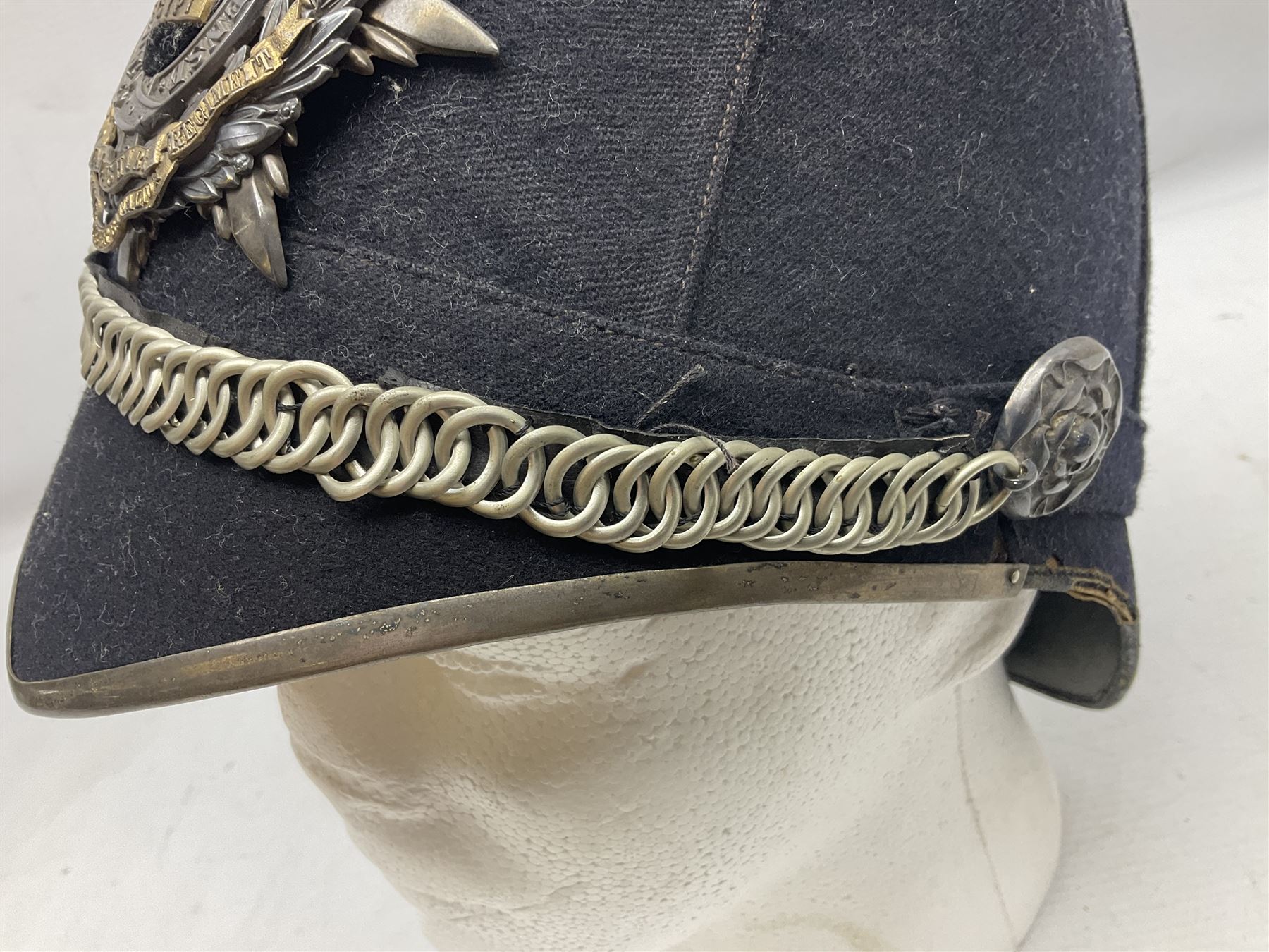 Victorian British Army South Lancashire Regiment 1st Volunteer Battalion other ranks blue cloth home service helmet with helmet plate, spike and chinstrap