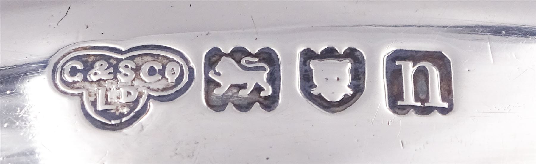 Edwardian silver tea caddy of bombe form, the hinged cover engraved with lion crest, upon four paw feet, hallmarked Goldsmiths & Silversmiths Co Ltd, London 1908, H8.5cm W10cm, approximate weight 5.25 ozt (163.2 grams)