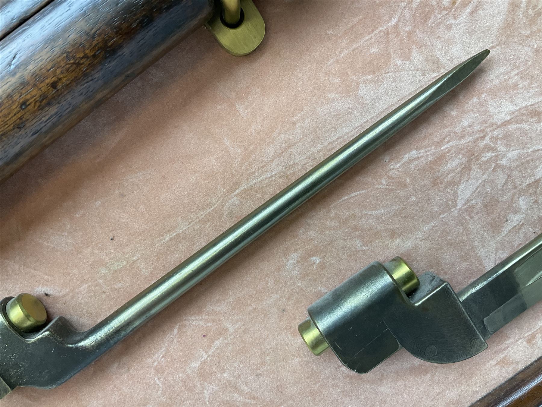 WW2 Lee Enfield No.4 Mk.1 .303 bolt-action rifle with hinged butt compartment, made by SA Ltd., Long Branch, Canada 1942, serial no.5L0646 L113cm; mounted on a framed display board with No.4 Mk.II spike bayonet, No.9 Mk.1 blade bayonet, two inert 5-round clips and brass biographical plaque by Antler Military Originals detailing DA Cert No.C3444 OLD STYLE DEACTIVATION SO FIREARMS CERTIFICATE REQUIRED OR RFD