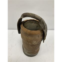 Late 19th/early 20th century leather covered artillery shell carrier, decorated with Royal Coat of Arms, with leather carrying handle supported by brass studs, H29cm excl handle