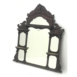  Late Victorian mahogany overmantle mirror, carved Prince of Wales feathers pediment, five shelves, six bevel edge mirror sections, W132cm, H148cm  