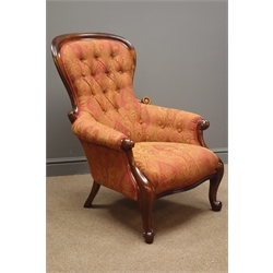  Victorian mahogany armchair, upholstered in red and gold fabric, scrolled arm supports and cabriole legs  