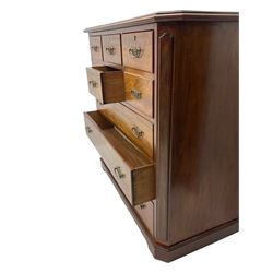Late 19th century mahogany chest, fitted with six short and three long drawers, canted corners with mirror