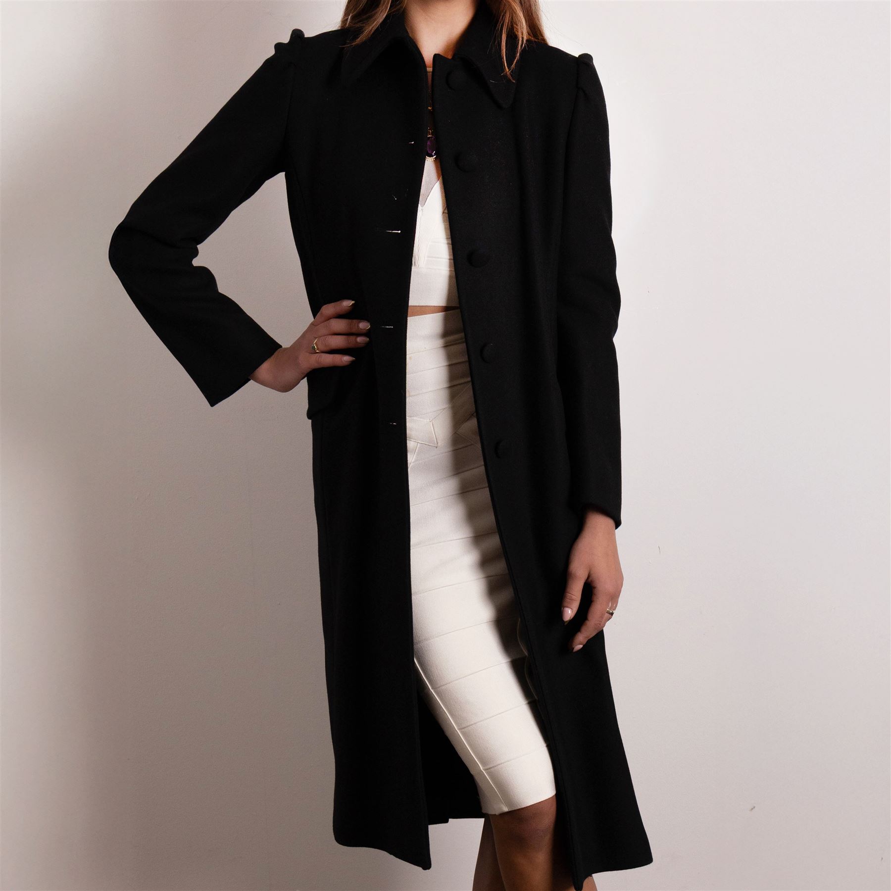 Prada - black Melton wool coat, in a redingote style with front fastening and fabric-covered buttons, flap pockets and a structured collar with slit to the back, size 44, unused with the original garment bag and hanger