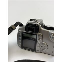 Canon EOS 350D digital camera with 'Canon Zoom Lens EF-S 18-55mm 1:3.5-5.6 II USM', with instruction manual and charger and two further lenses, Canon Ultrasonic 'Canon Zoom Lens EF 35-105mm 1:4.5-5.6' and a Canon Ultrasonic 'Canon Zoom Lens EF 75-300mm 1:4-5.6 III USM'