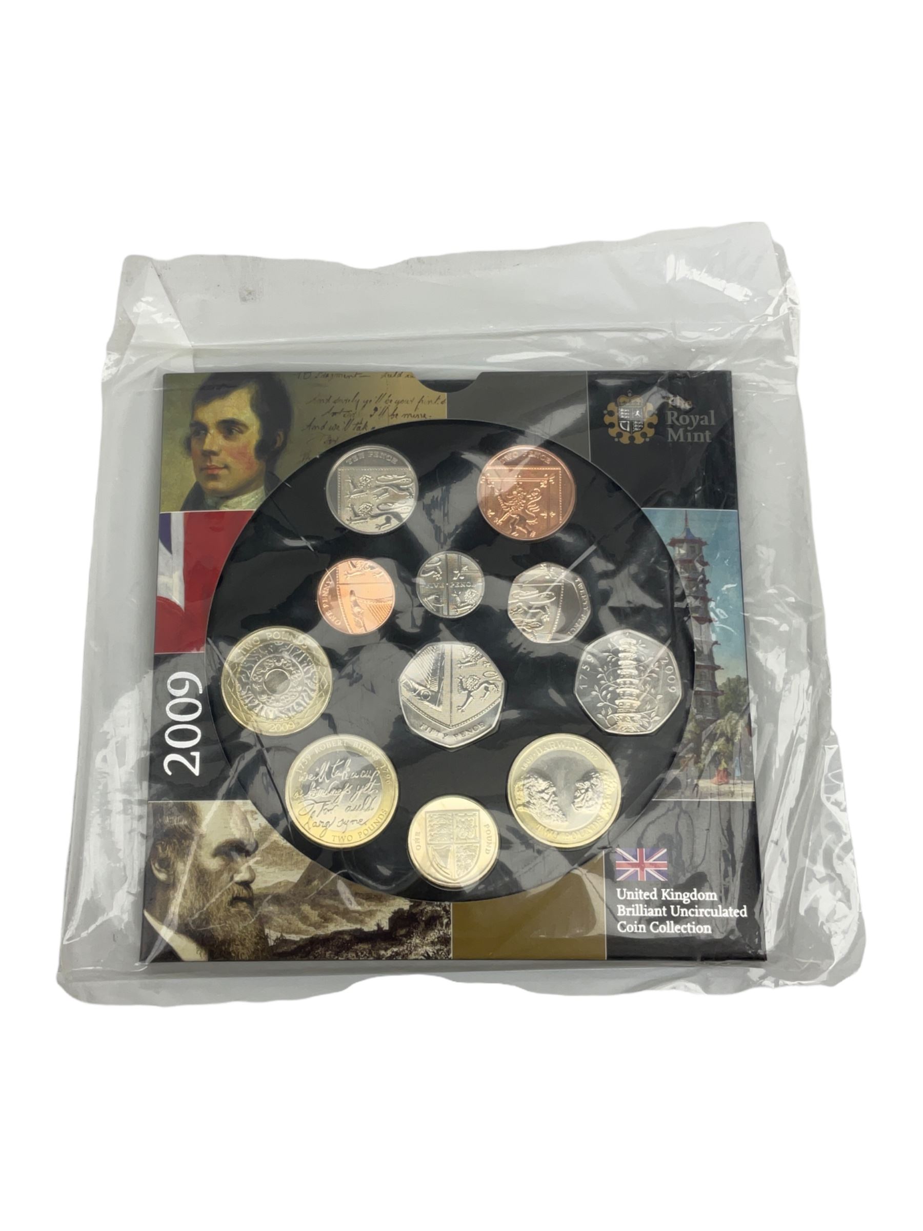 The Royal Mint United Kingdom 2009 brilliant uncirculated eleven coin set, including Kew Gardens fifty pence, in card folder