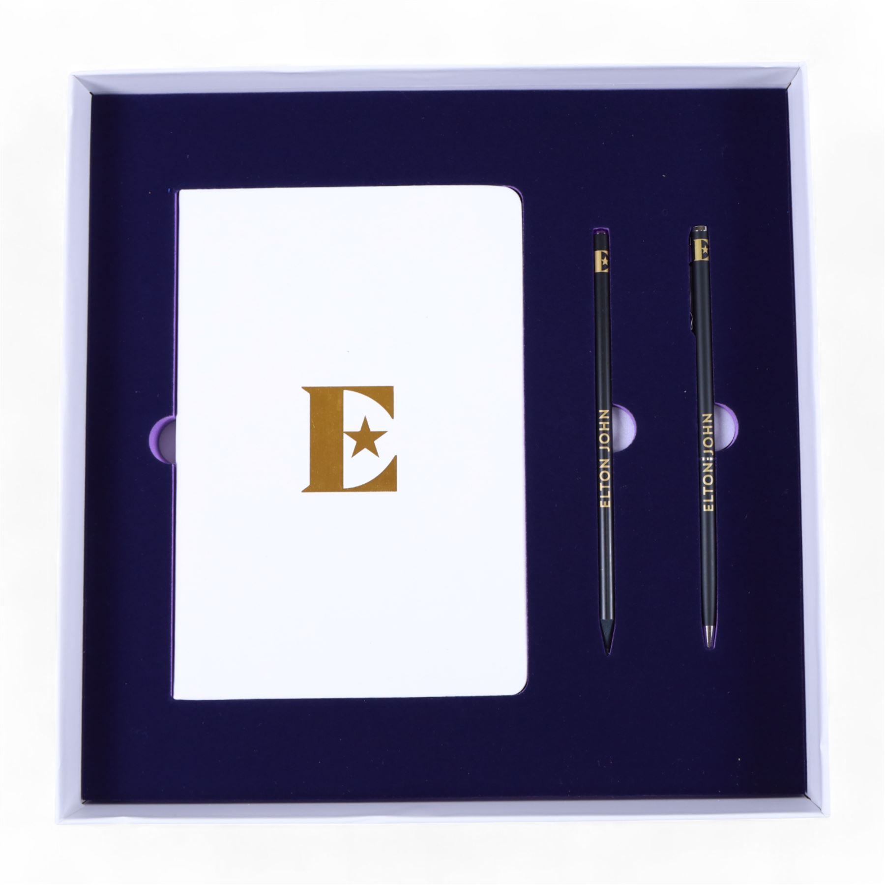 Elton John Farewell Yellow Brick Road tour merchandise, comprising programme, tote bag and VIP giftset with lanyard, wallet, luggage tag and keyring, in white box with gilt lettering, together with two limited edition Farewell Yellow Brick Road lithographs