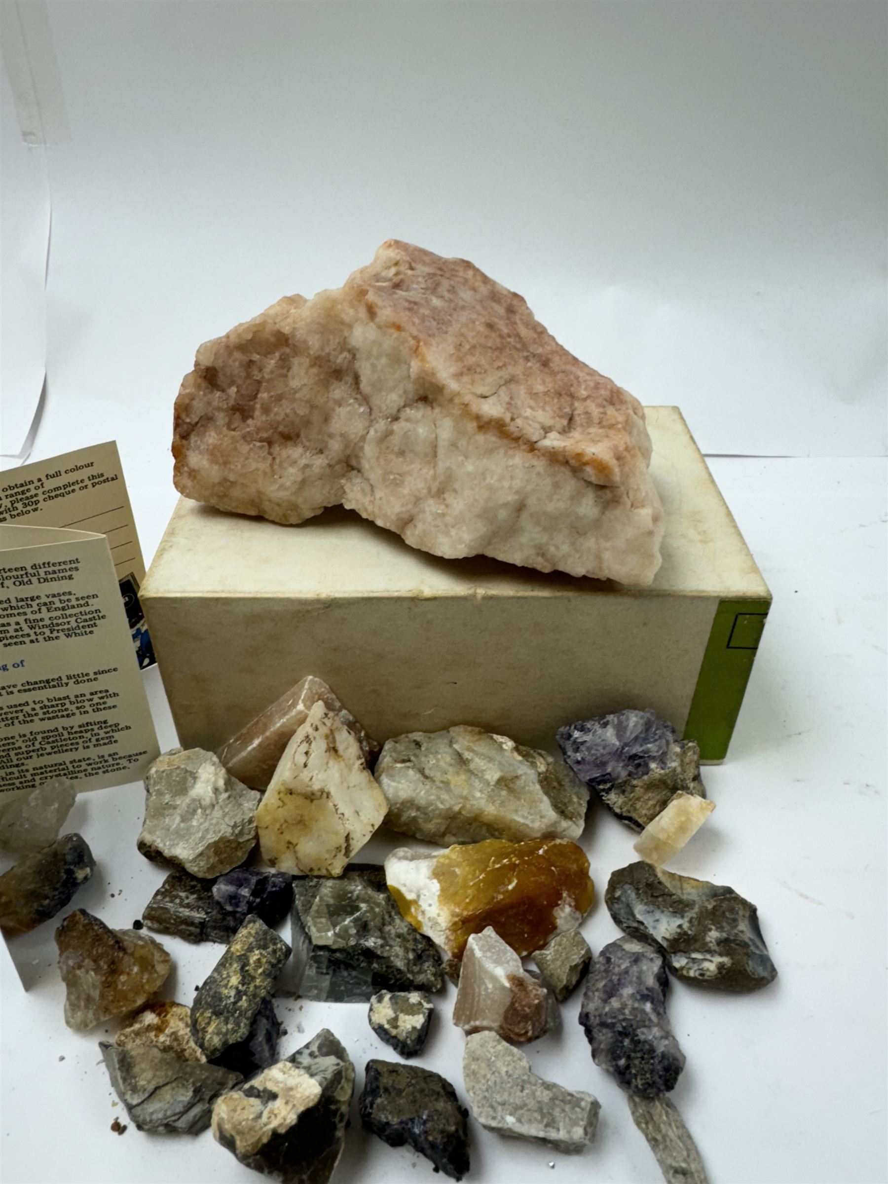 Collection of raw Blue John specimens, together with other mineral specimens