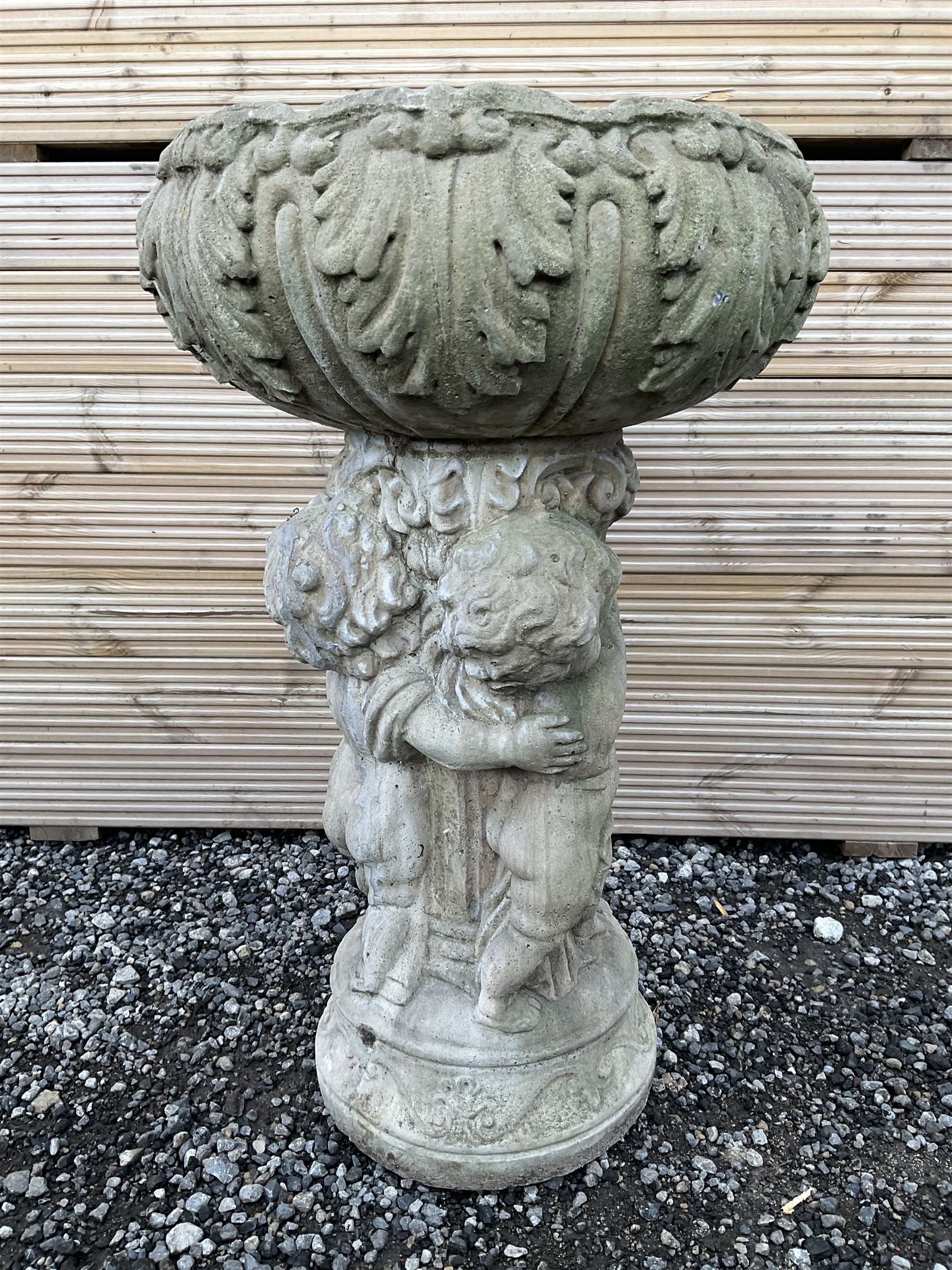 Cast stone planter or bird bath, supported by classical putti on circular base - THIS LOT IS TO BE COLLECTED BY APPOINTMENT FROM DUGGLEBY STORAGE, GREAT HILL, EASTFIELD, SCARBOROUGH, YO11 3TX