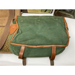 Miscellaneous shooting accessories - W.J. Bowman & Sons clay pigeon launcher; two leather cartridge belts; three cartridge bags; two canvas/leather game bags; and two metal/wooden cartridge boxes