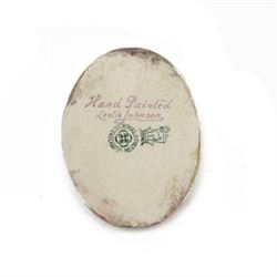 Royal Doulton porcelain plaque, hand painted with a portrait of a young woman, signed by Leslie Johnson, with printed backstamp verso, H5.5cm