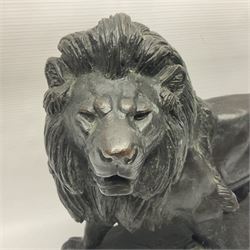 After Paul Edouard Delabrierre (French, 1829-1912), bronze, model of a lion, upon an oval base, signed E Delabrierre, overall H29.5cm, L46cm
