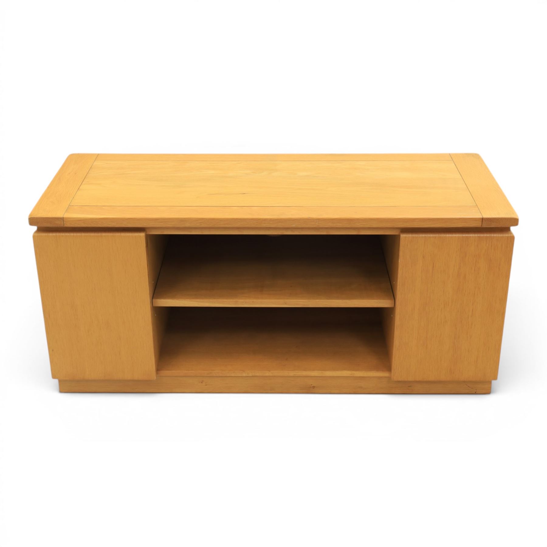Contemporary light oak television or media unit, two cupboards and two open shelves