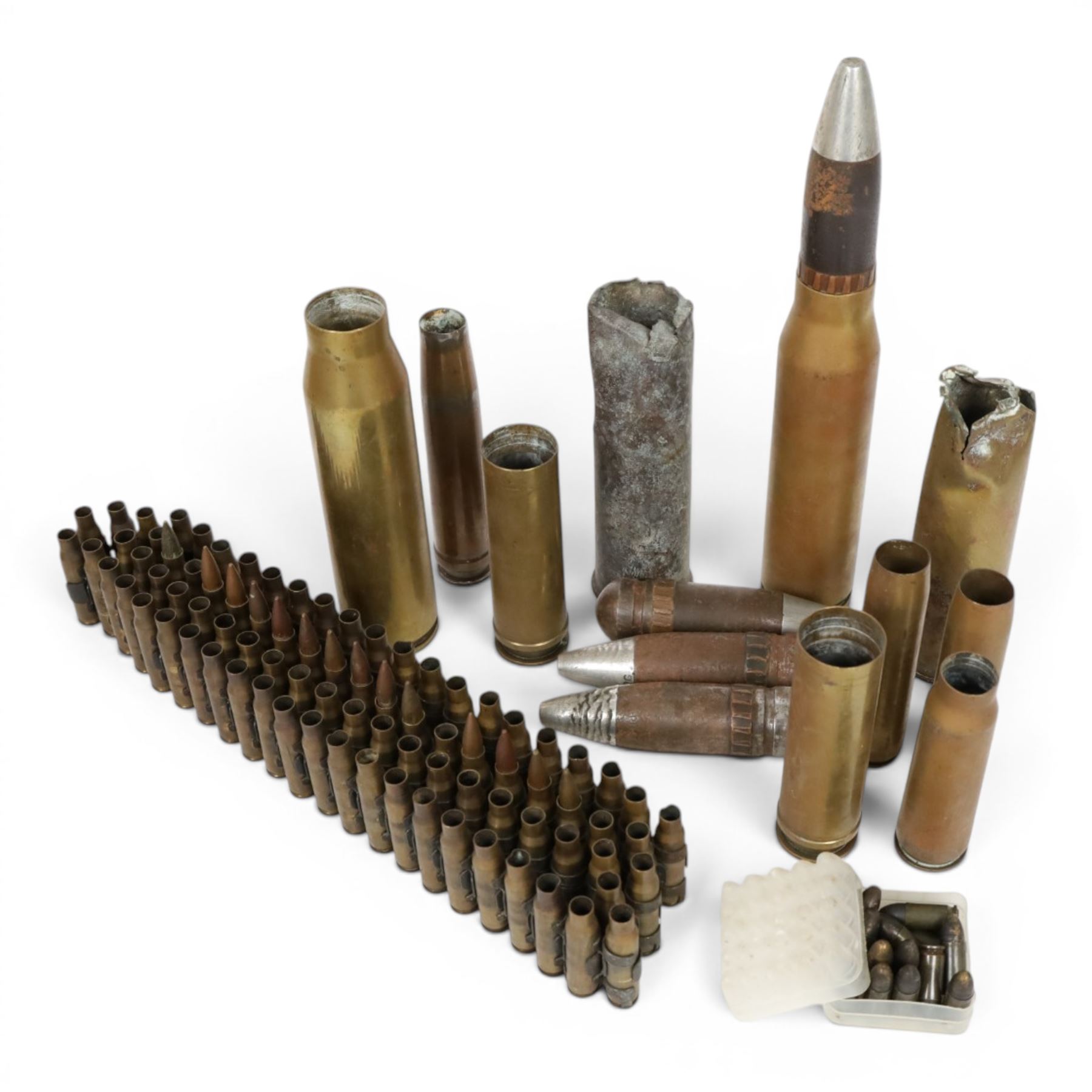 Collection of inert shells and cases, including 30mm Raden shell, L2A2 ammunition in clips etc 