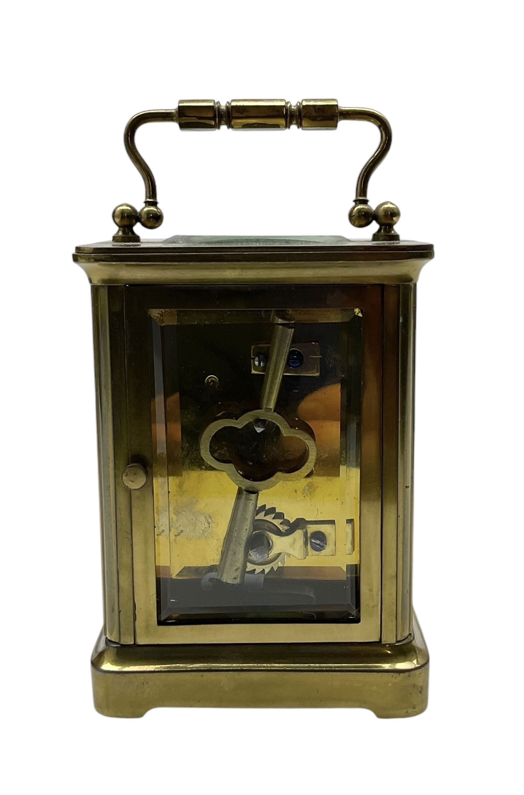 French-19th century timepiece carriage clock in brass corniche case with a cylinder platform escapement. With key. 